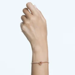Bracelet femme jonc Swarovski Millenia métal doré rose et cristaux