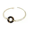 Bracelet femme PHEBUS acier doré et acetate
