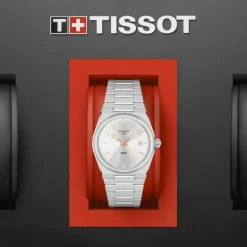 Montre femme chronographe Tissot PRX 35mm acier argenté aiguilles roses T1372101103100