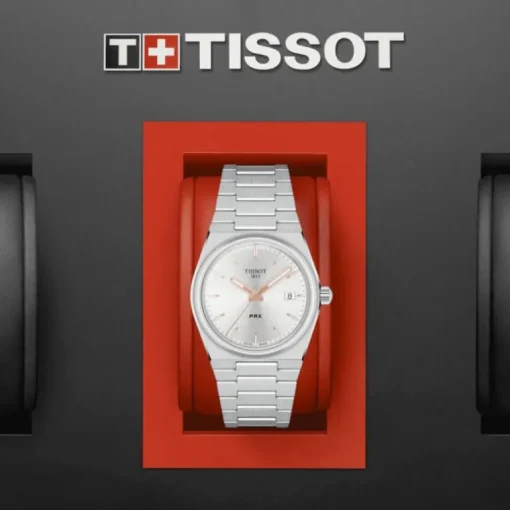 Montre femme chronographe Tissot PRX 35mm acier argenté aiguilles roses T1372101103100
